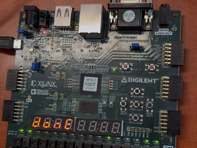The Nexys A7-100T board running the controller, with “donE” on its seven-segment display.