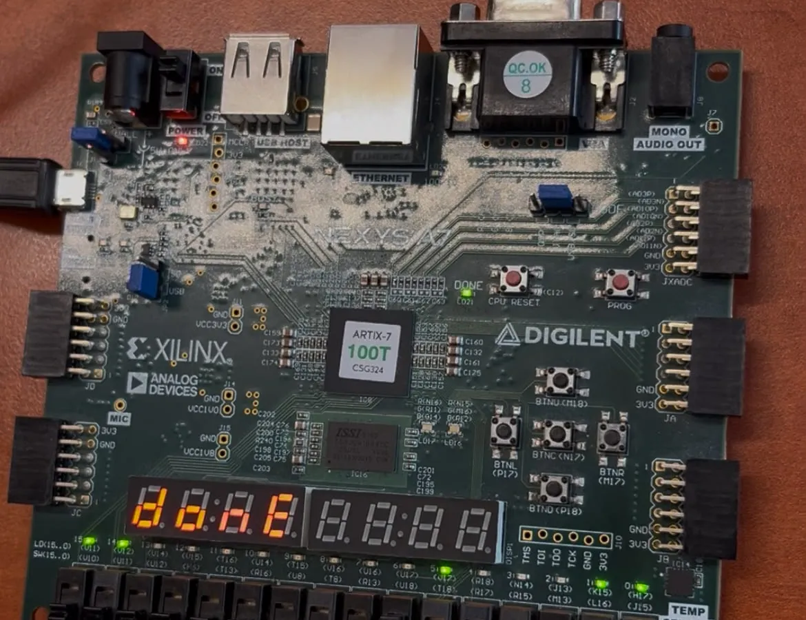 The Nexys A7-100T board running the controller, with “donE” on its seven-segment display.